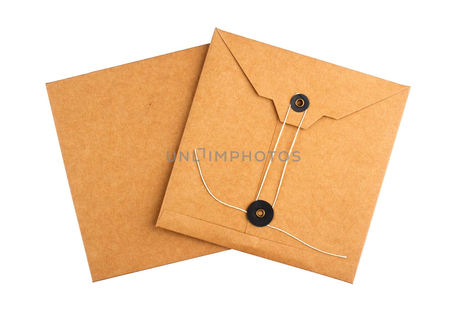 top view closeup two of closed square vintage craft paper envelopes with textile thread enclosing isolated on white background