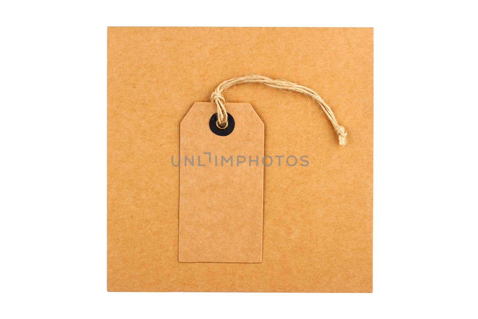 top view closeup gift set of craft paper tag and envelope with textile thread mockup isolated on white background