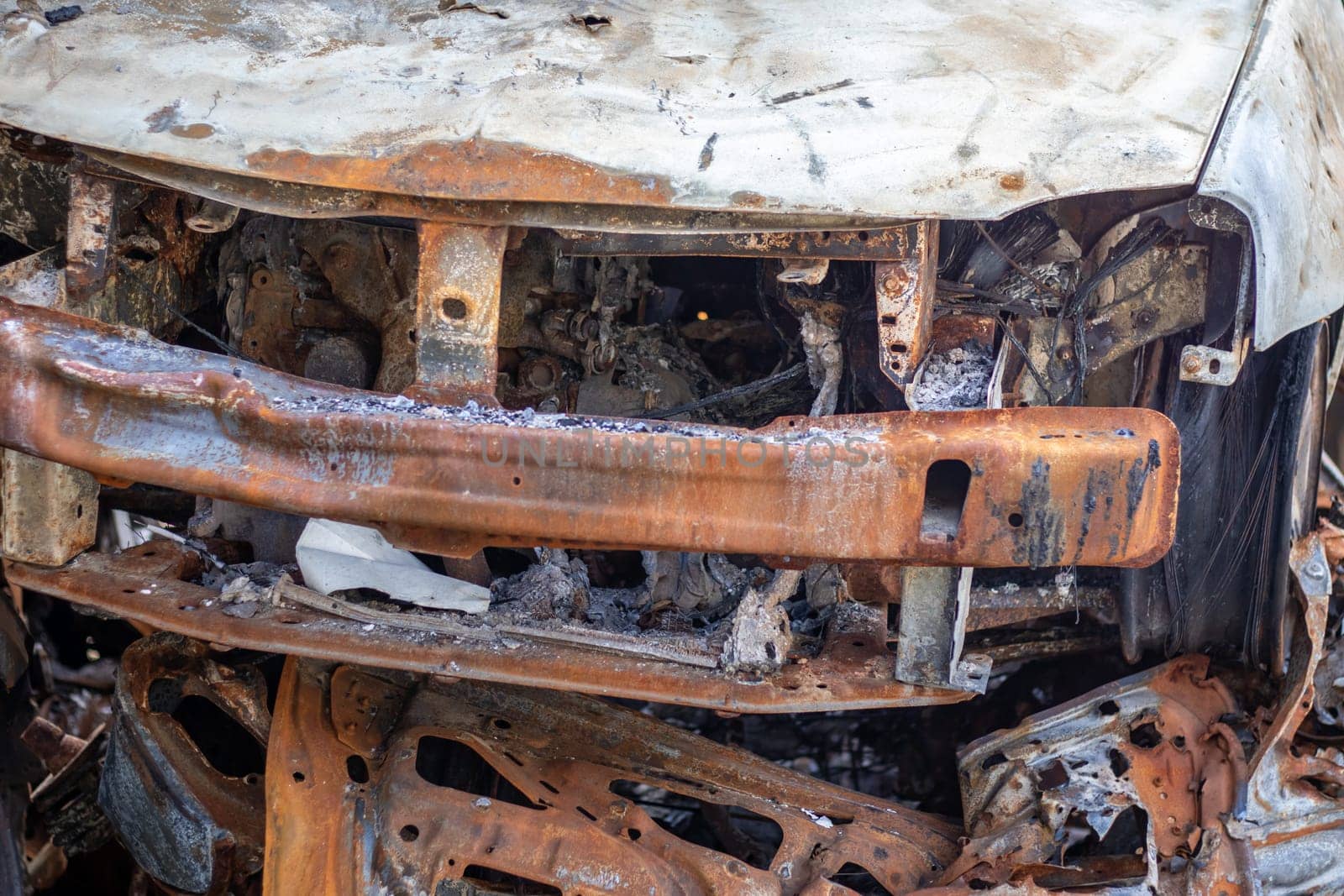 Russian invasion of Ukraine in 2022, destroyed and burned cars. Cars were beaten with shrapnel and burned. Irpensky automobile cemetery. The consequences of the war in a peaceful city near Kyiv