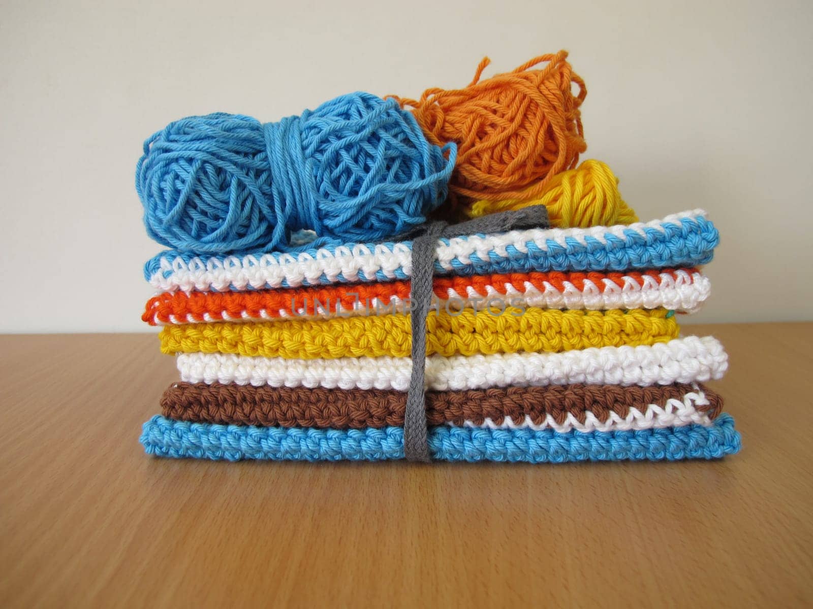Reusable crocheted and knitted dishcloths from wool scraps
