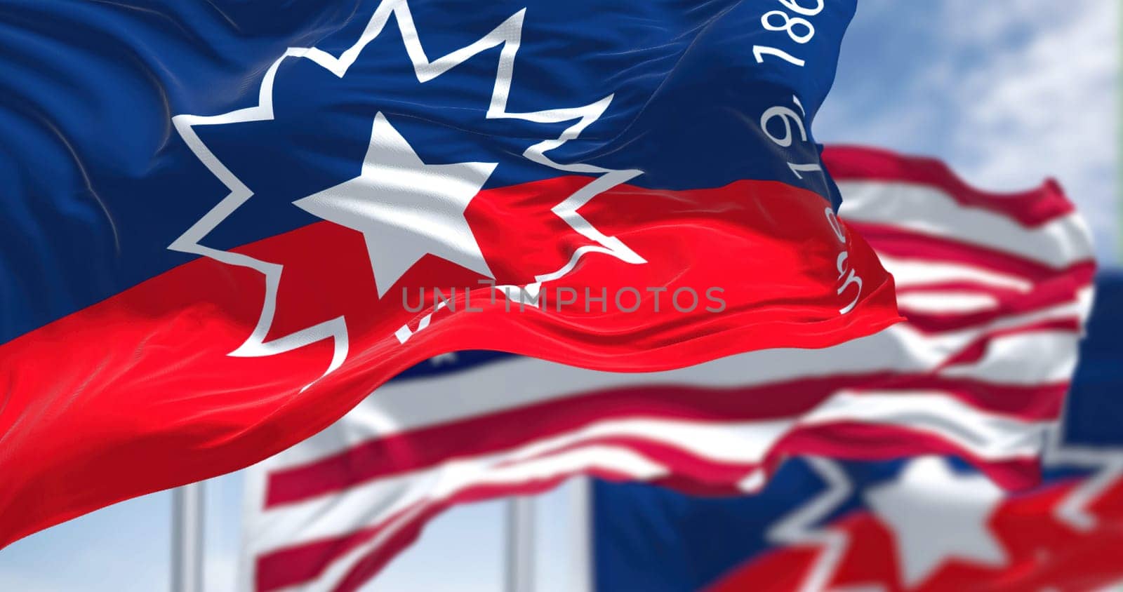 The flags of the Arkansas state and United States waving in the wind. Democracy and independence. American state. Seamless 3D animation