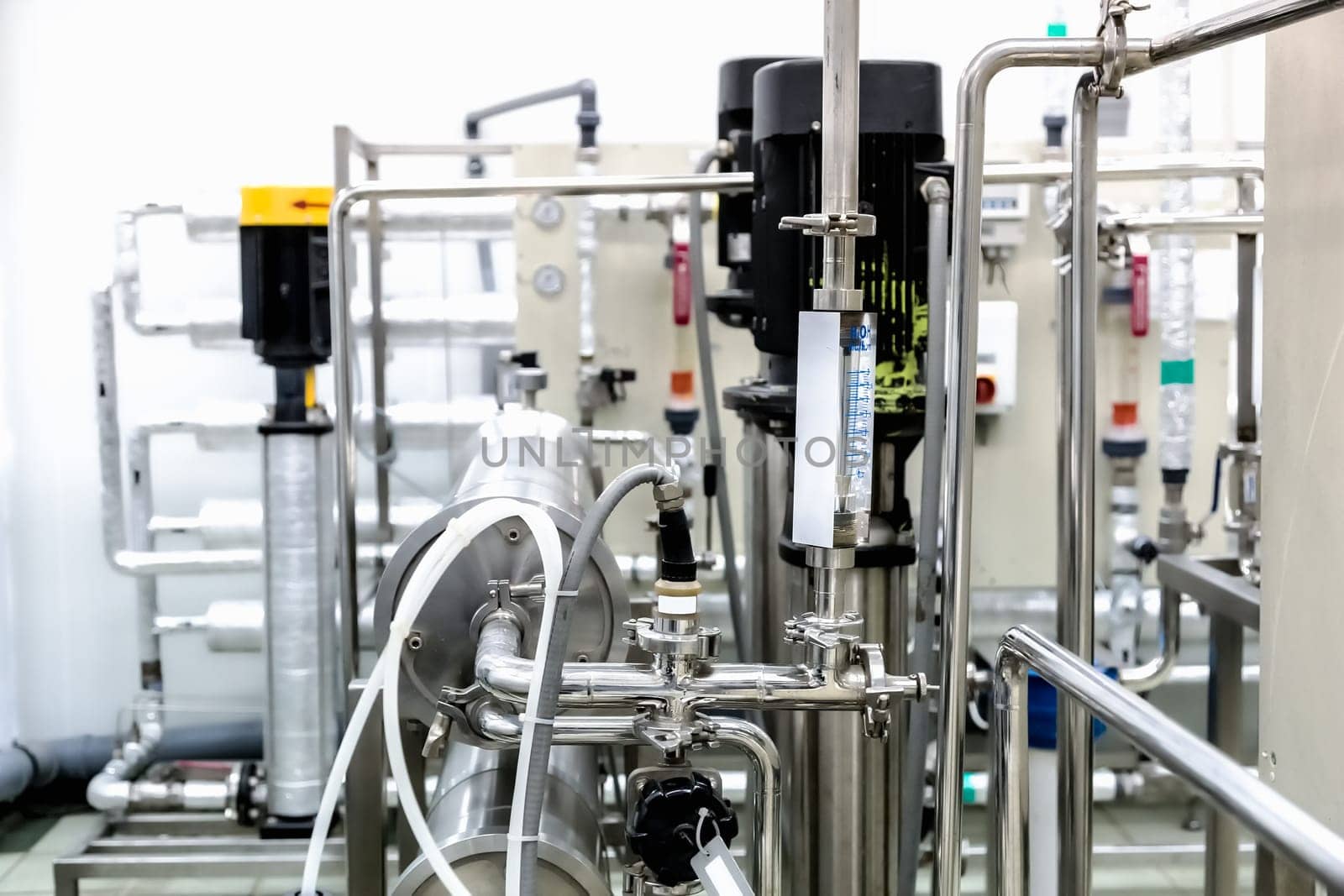 Pipes and water pump on pharmaceutical industry or chemical plant