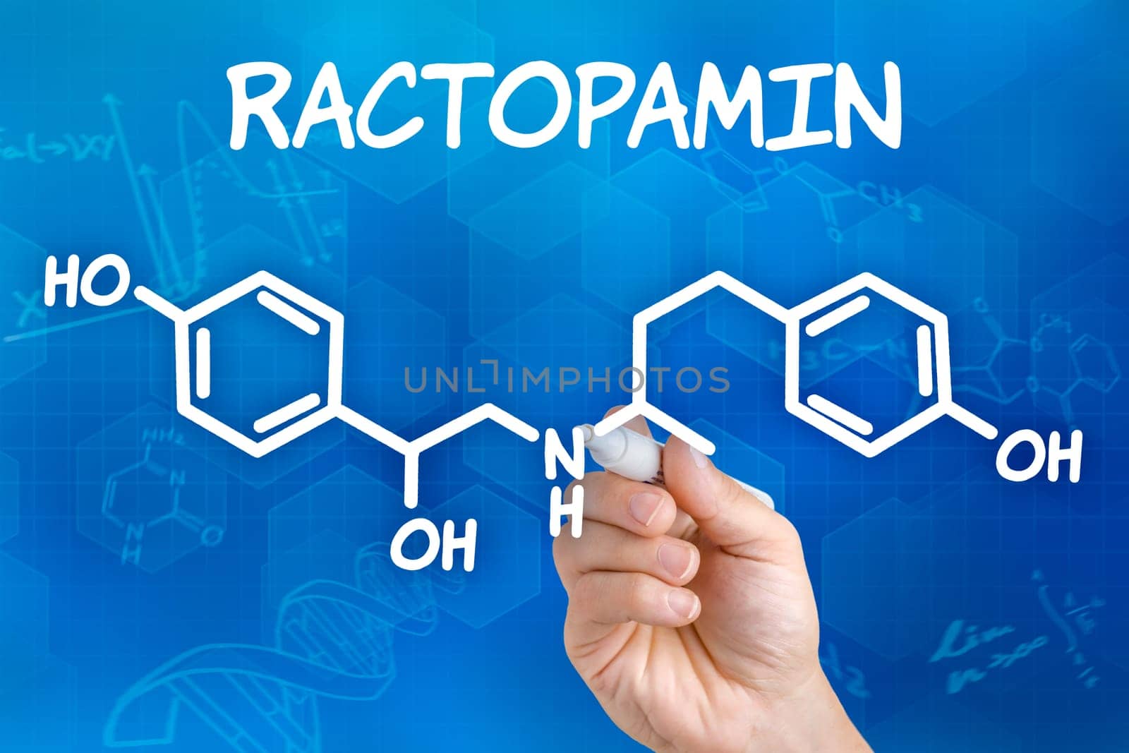 Hand with pen draws chemical structural formula of ractopamine