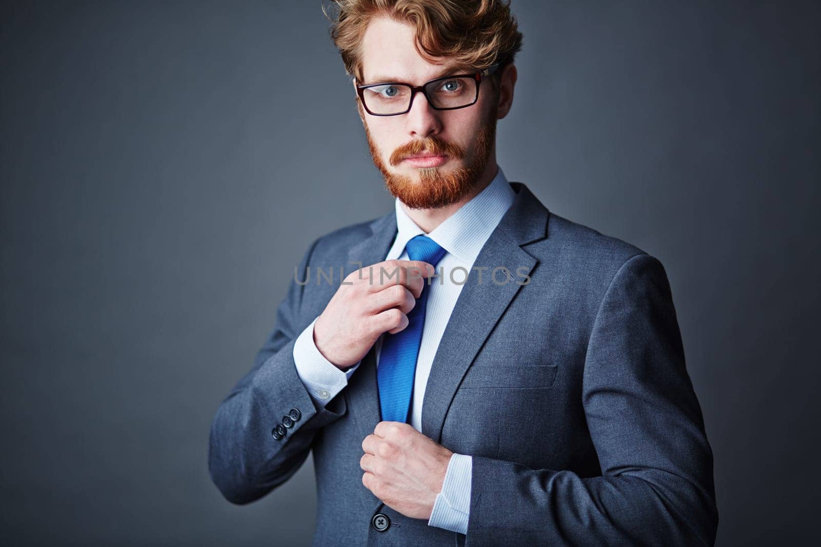 Handsome man in eyeglasses and elegant suit