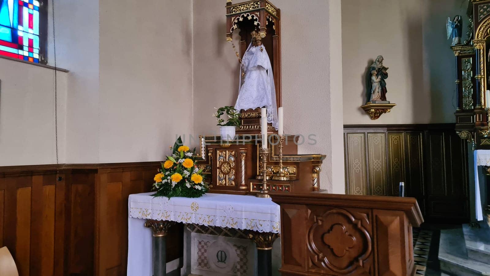 ROSPORT, LUXEMBURG  - APRIL 16, 2022:.Rosport, Luxemburg - April 16, 2022:.In the parish church of Rosport near the Tudor Museum on the border between Luxembourg and Germany