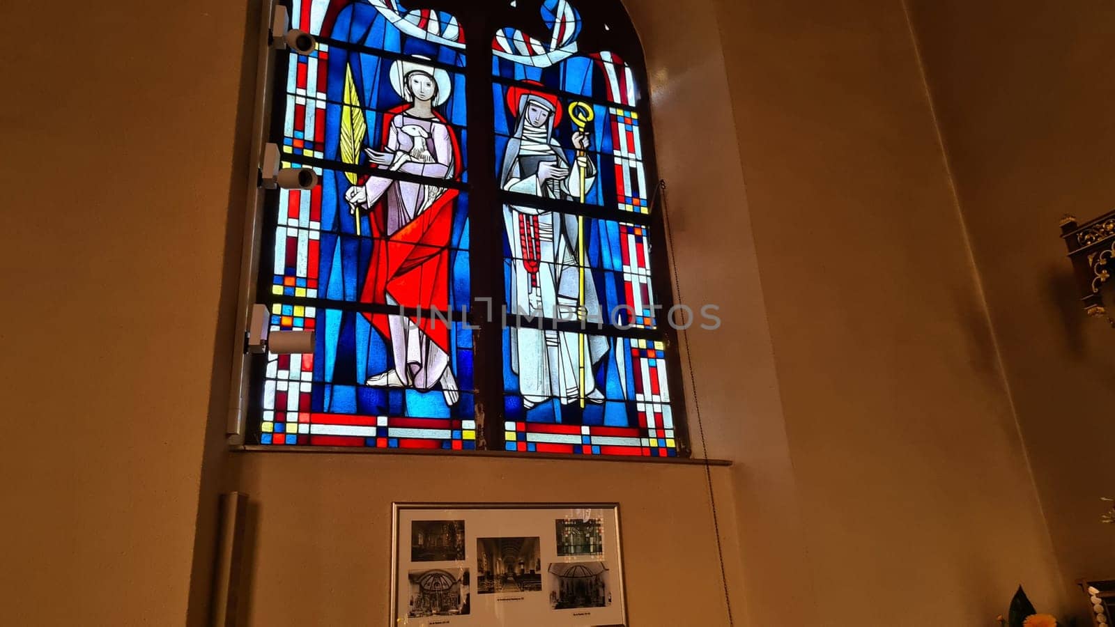 ROSPORT, LUXEMBURG  - APRIL 16, 2022:.Rosport, Luxemburg - April 16, 2022:.In the parish church of Rosport near the Tudor Museum on the border between Luxembourg and Germany