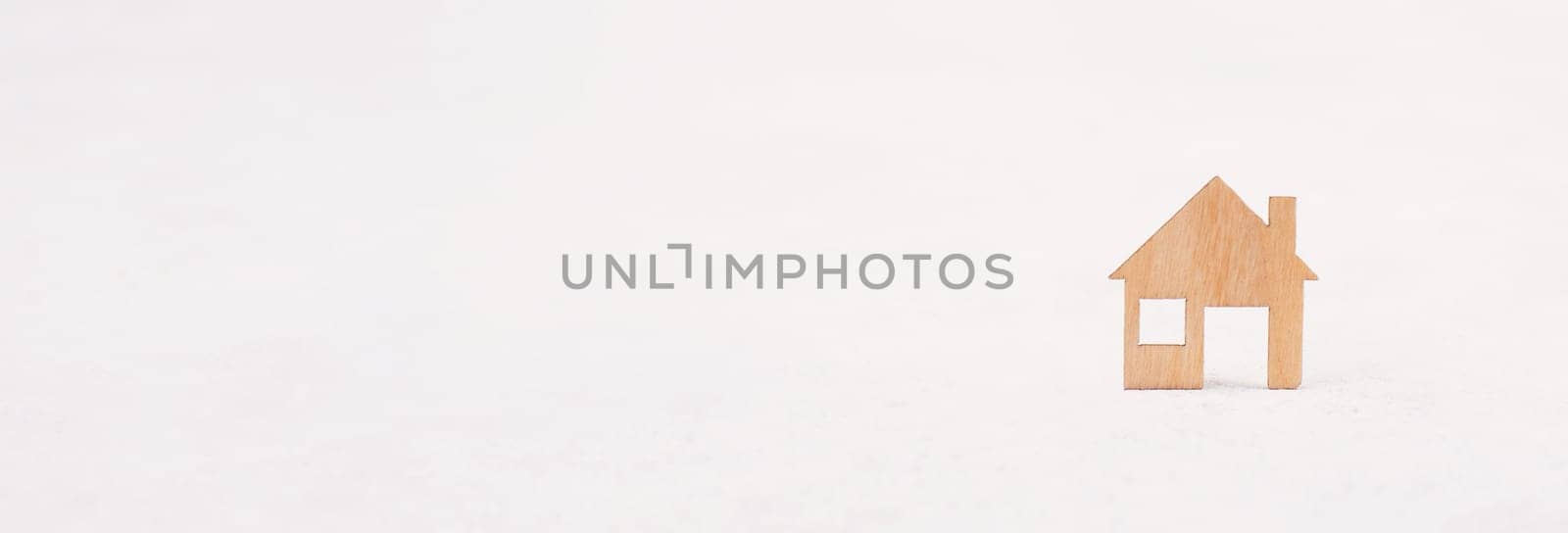 Small wooden house, planing a new home, real estate, owning property, copy space for text