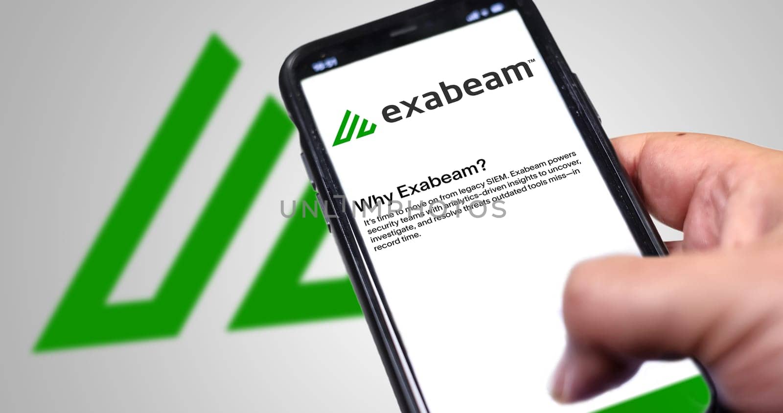 San Francisco, USA, June 2022: hand holding a phone with Exabeam mobile application on screen. Exabeam is a leading provider of the software for analyzing user and company behavior