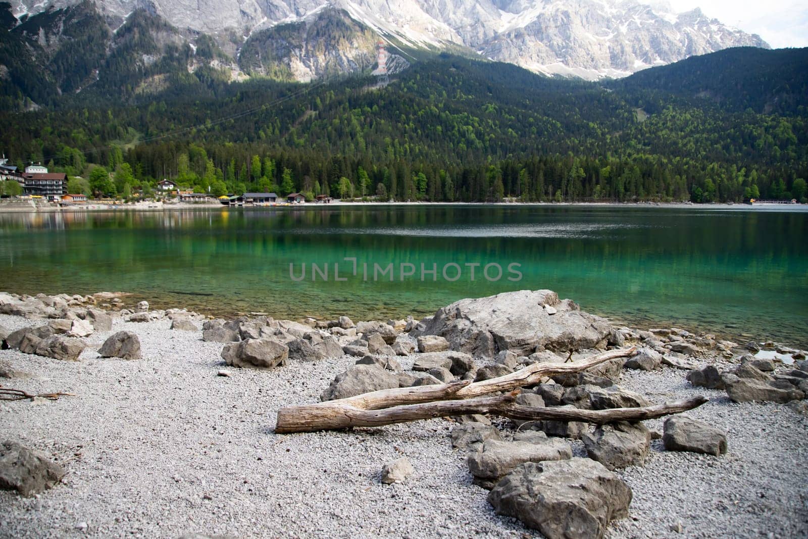 Faboulus landscape of Eibsee Lake with turquoise water in front of Zugspitze summit, Garmisch-Partenkirchen, Bavarian alps, Germany, Europe