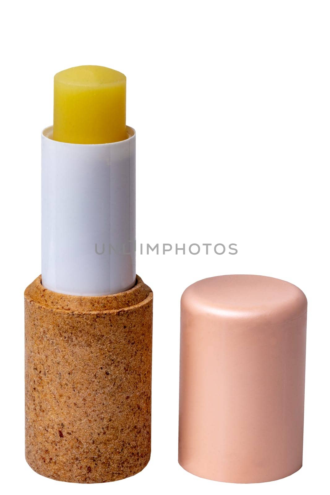 Lip balms. Close-up of a pink brown lip care stick or chapstick isolated on a white background. Macro. Cosmetics for face. Concept beauty. Space.
