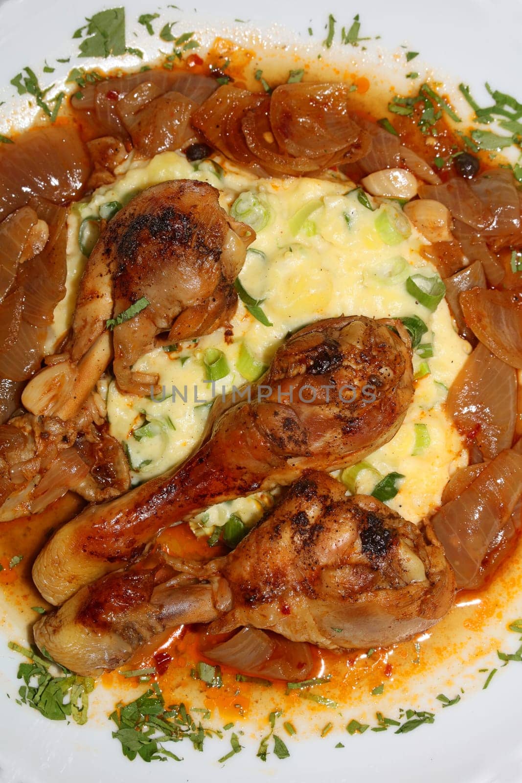 Chicken legs close up braised with butcher's onions served with mashed herb potatoes greek cuisine modern high quality print
