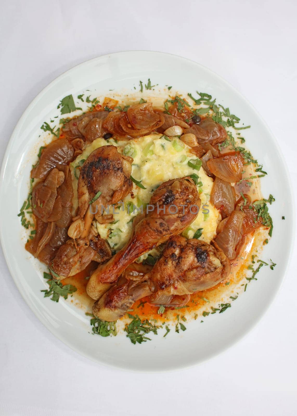 Chicken legs close up braised with butcher's onions served with mashed herb potatoes greek cuisine modern high quality print
