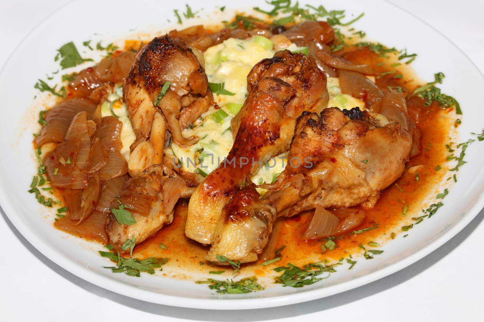 Chicken legs close up braised with butcher's onions served with mashed herb potatoes greek cuisine modern high quality print