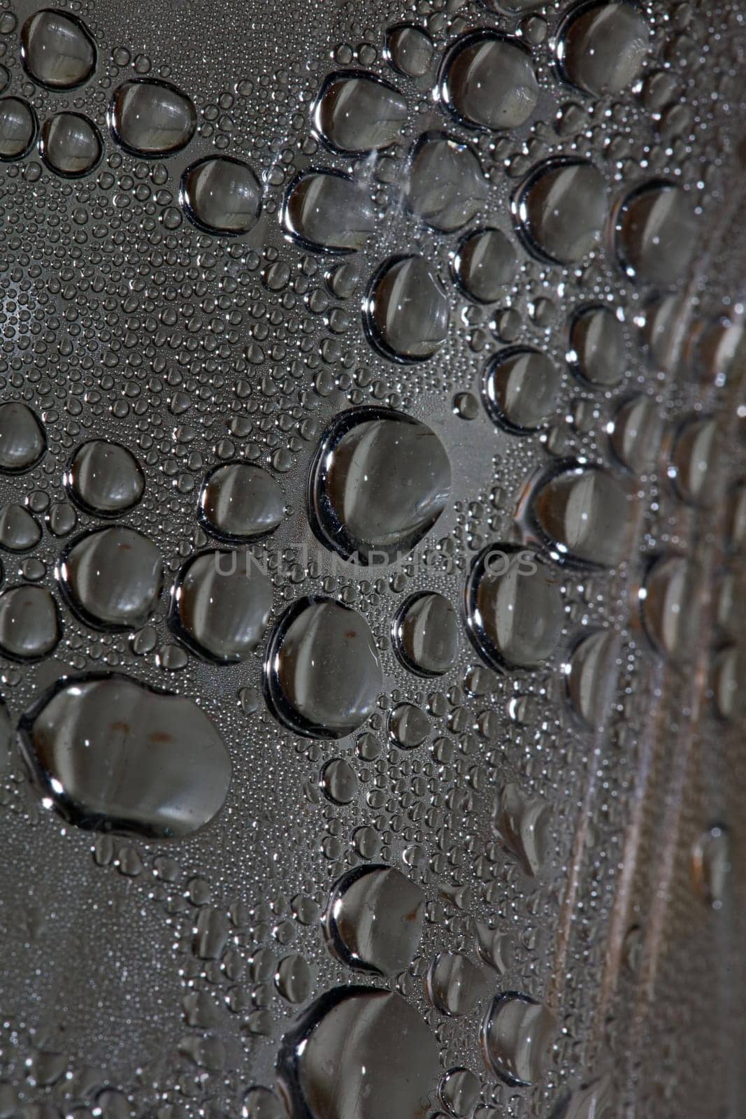 Water drops macro from a plastic bottle modern background high quality print fifty megapixels