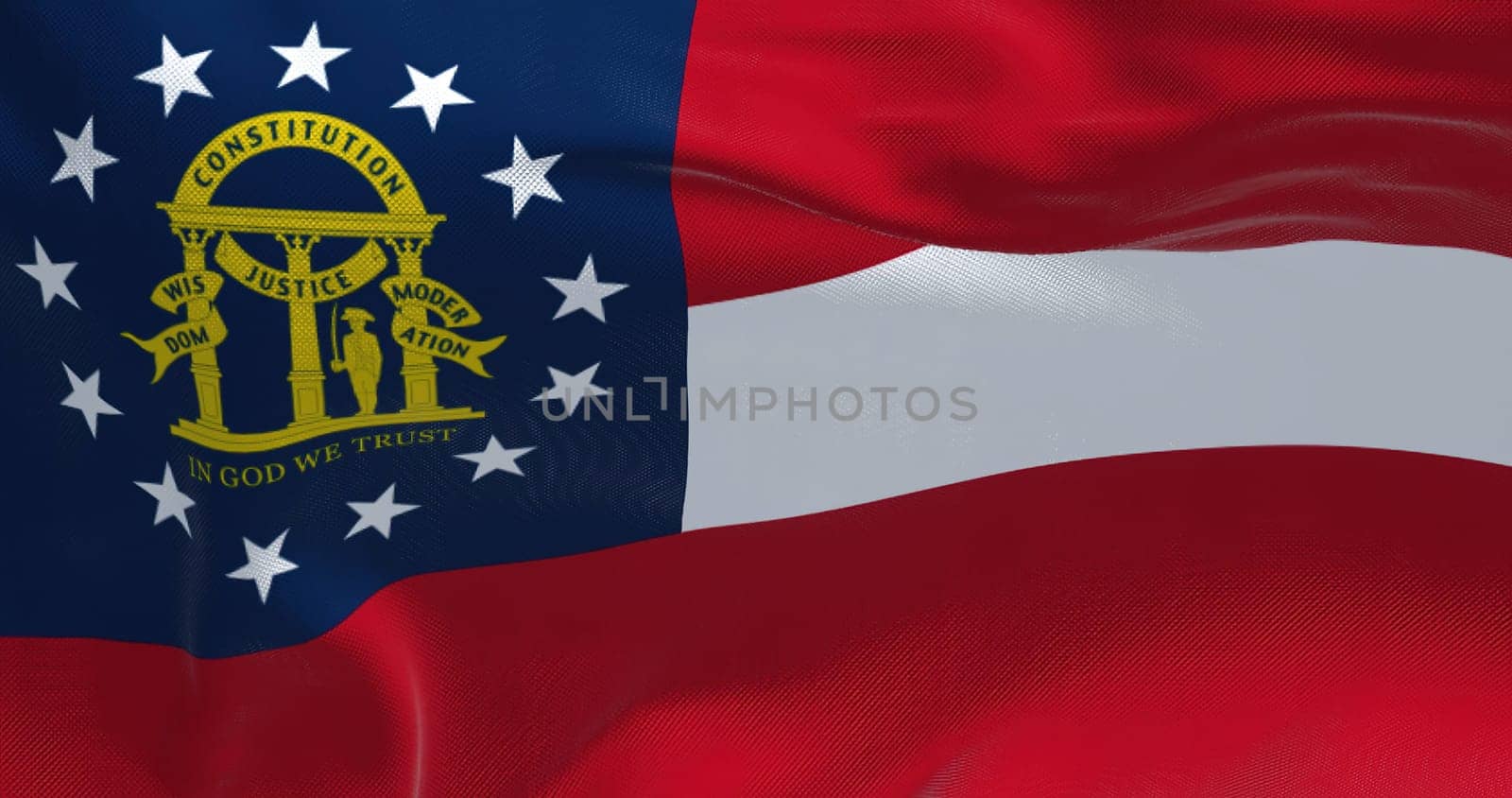 Close up of the state flag of Georgia waving in the wind. Georgia is a state in the Southeastern region of the United States. Democracy and independence.