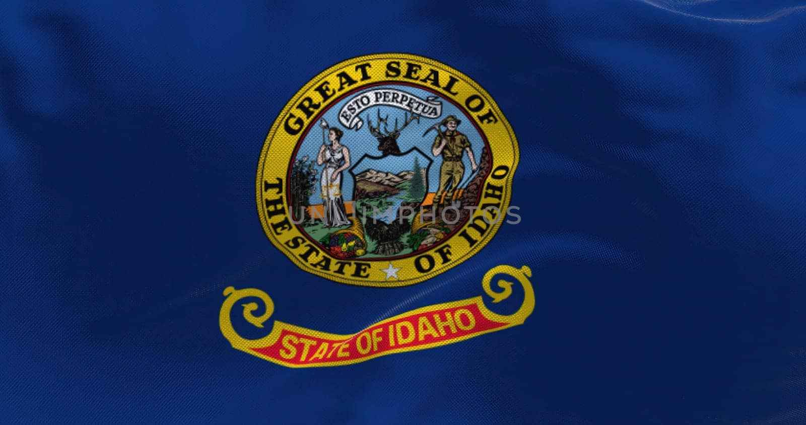 Close up view of the Idaho state flag waving. Idaho is a state in the Pacific Northwest region of the US. Close up view