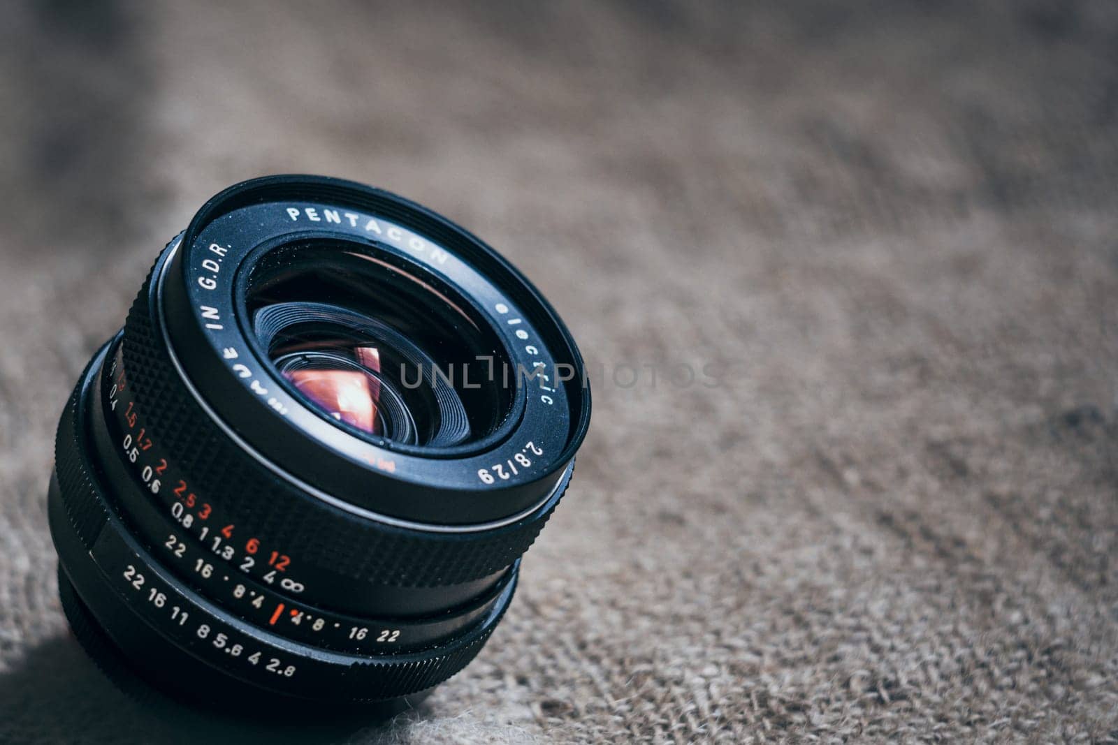 Antwerp, Belgium, June 2022, Illustrative Editorial: Shot of vintage Pentacon Electric camera lens, made in the DDR. Many enthusiasts mount vintage lenses on their digital camera.