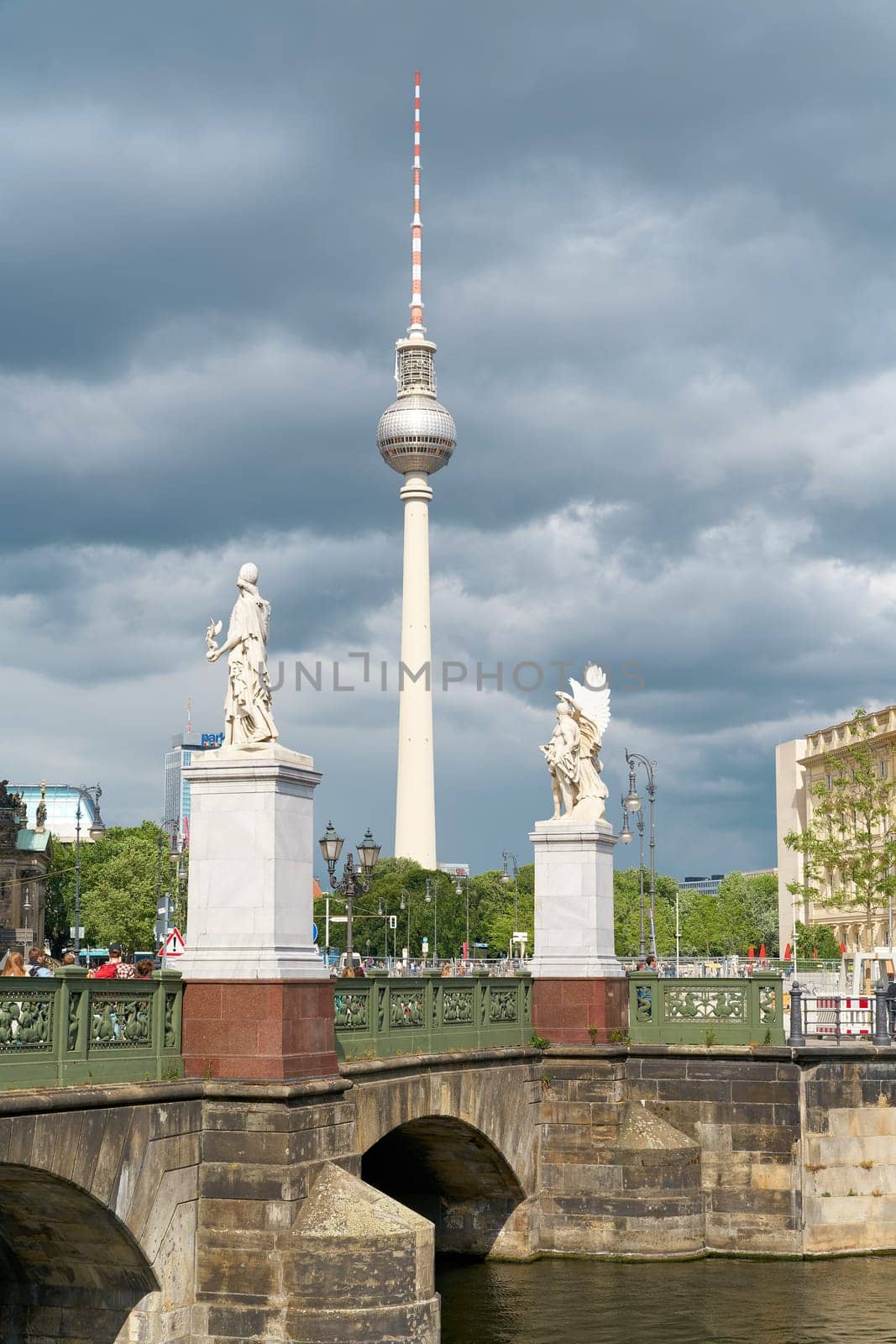 Schlossbruecke, Castle bridge by the architect Schinkel in Berlin. In the background the television tower.