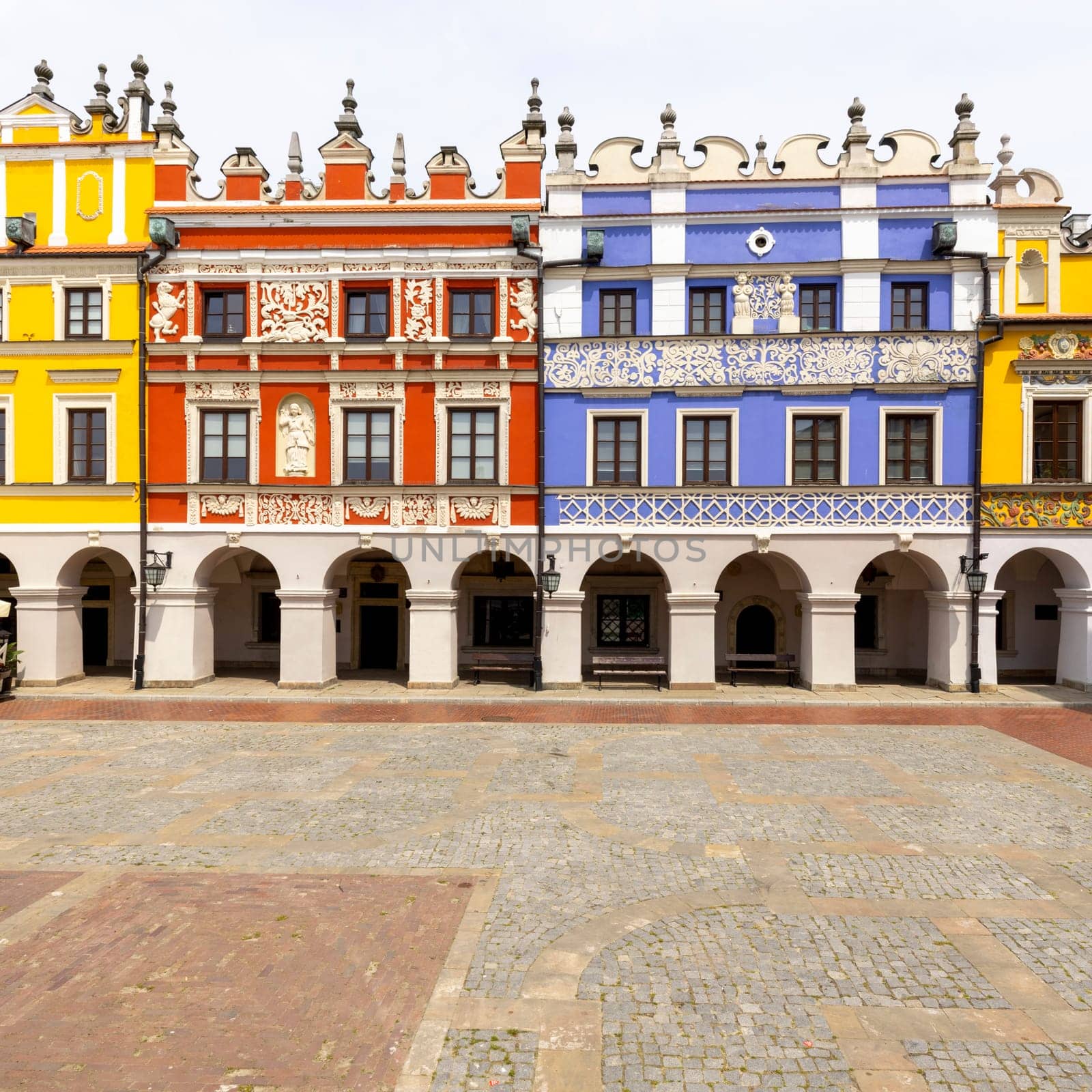 Zamosc, Poland - May 25, 2022: Medieval armenian tenement houses , colorful mannerist-baroque tenement houses in the Old Town, Great Market Square