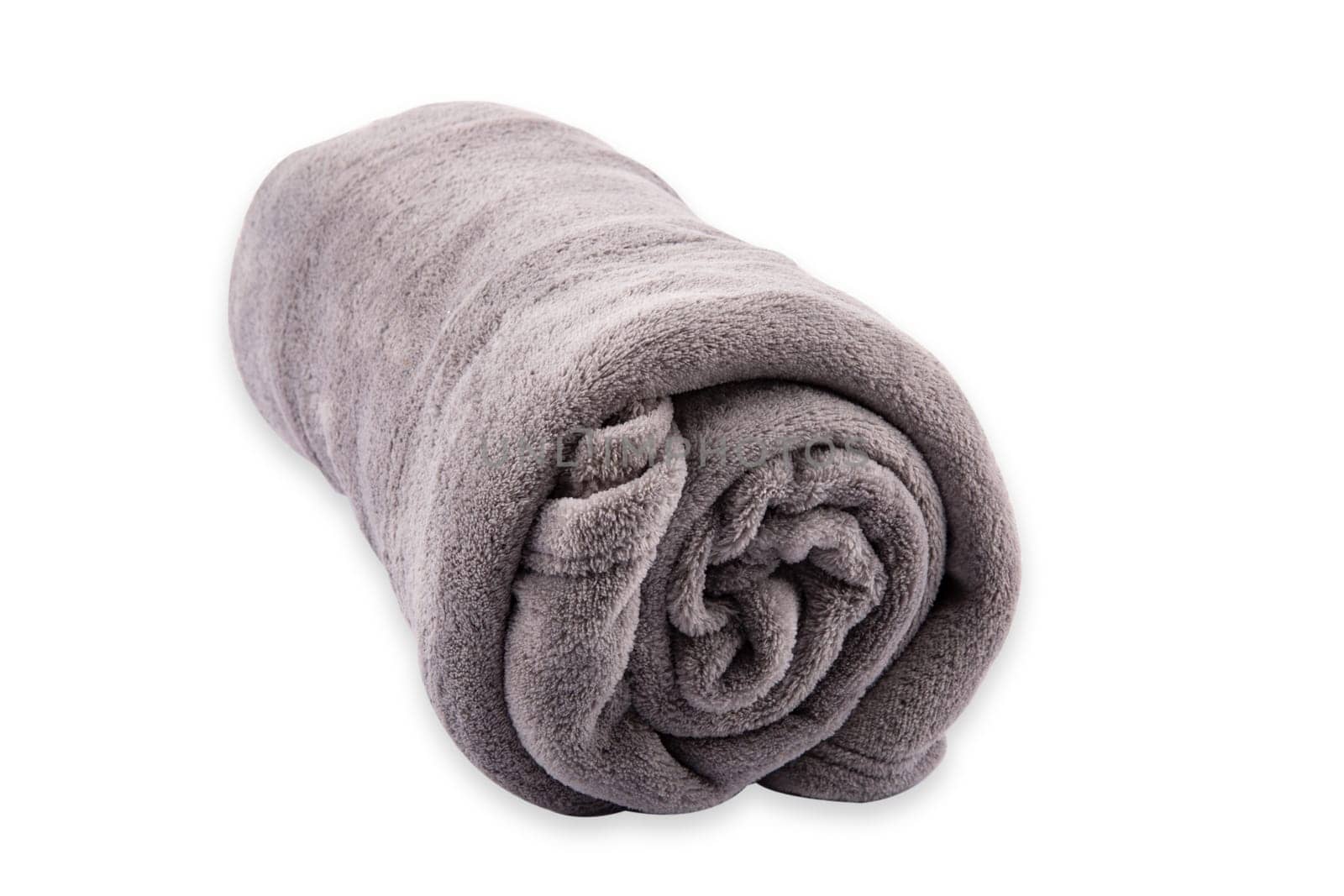 Gray rolled microfiber blanket isolated over white background