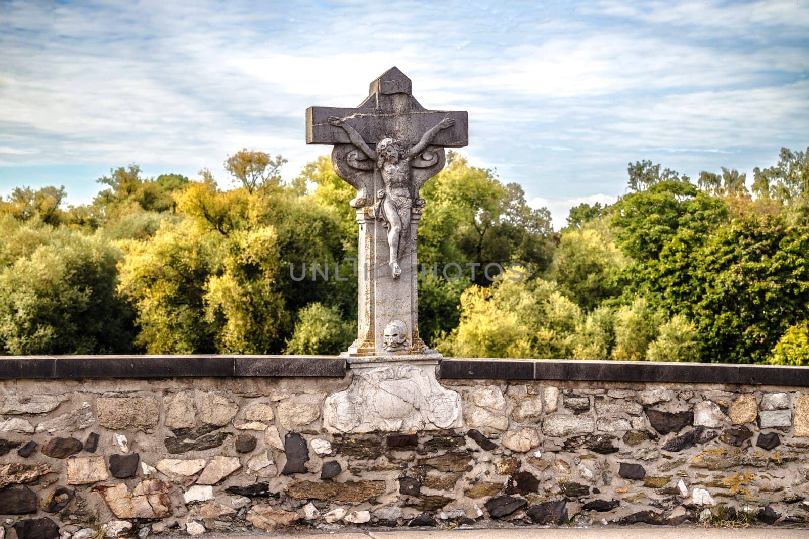Stone Jesus on Bridge in Limburg Hesse on a sunny Day