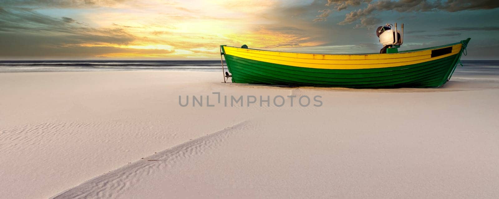 Sunrise over Baltic Sea with empty fishing boat - Debki, Pomerania, Poland