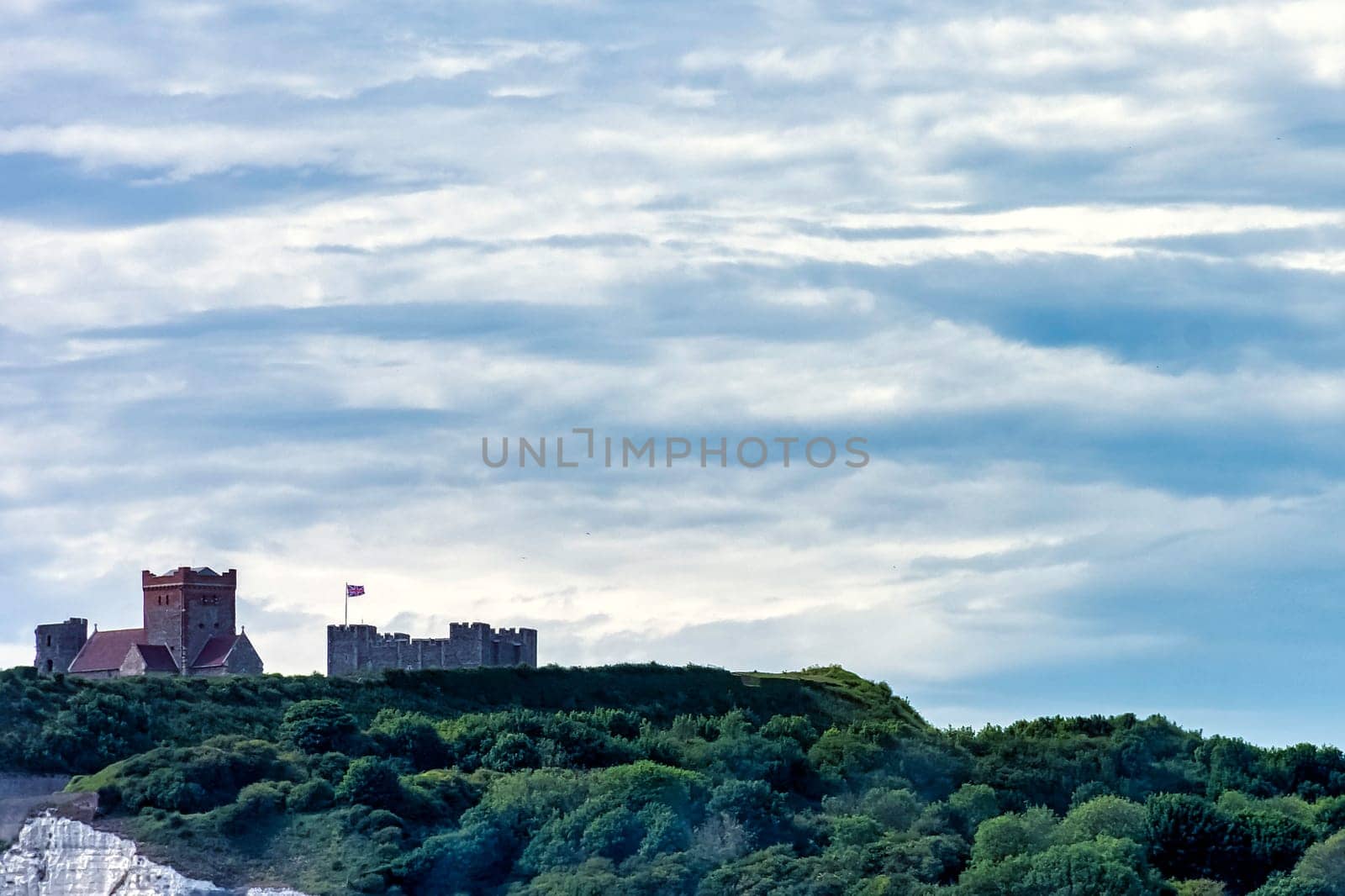White cliffs of England with Dover Castle in Dover, Kent, United Kingdom
