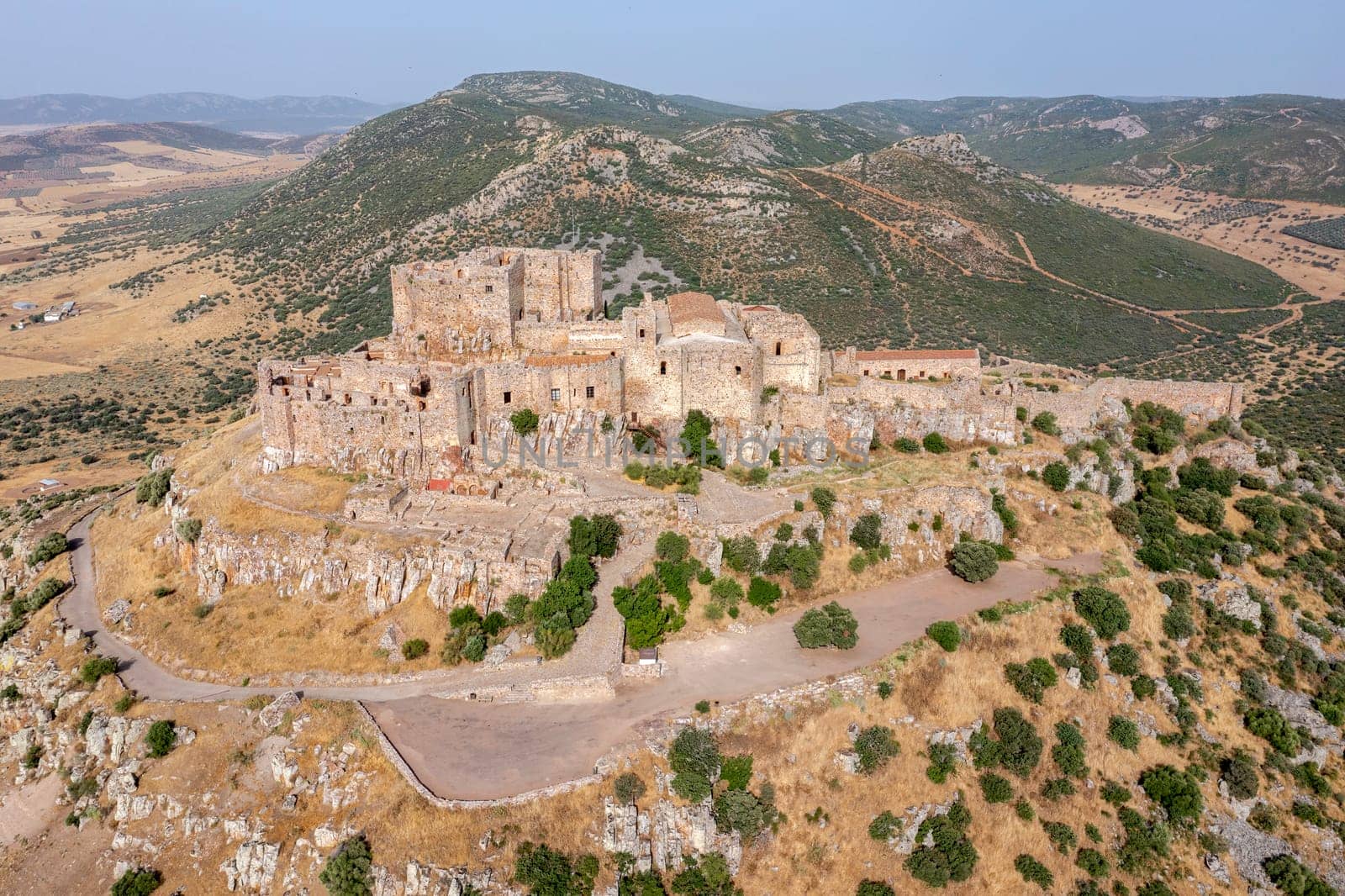 The hilltop castle fortress and former convent of Calatrava La Nueva, in Aldea Real, Ciudad Real province Castilla La Mancha Spain Ciudad Real, Castilla la Mancha, Spain, Rear overhead aerial view