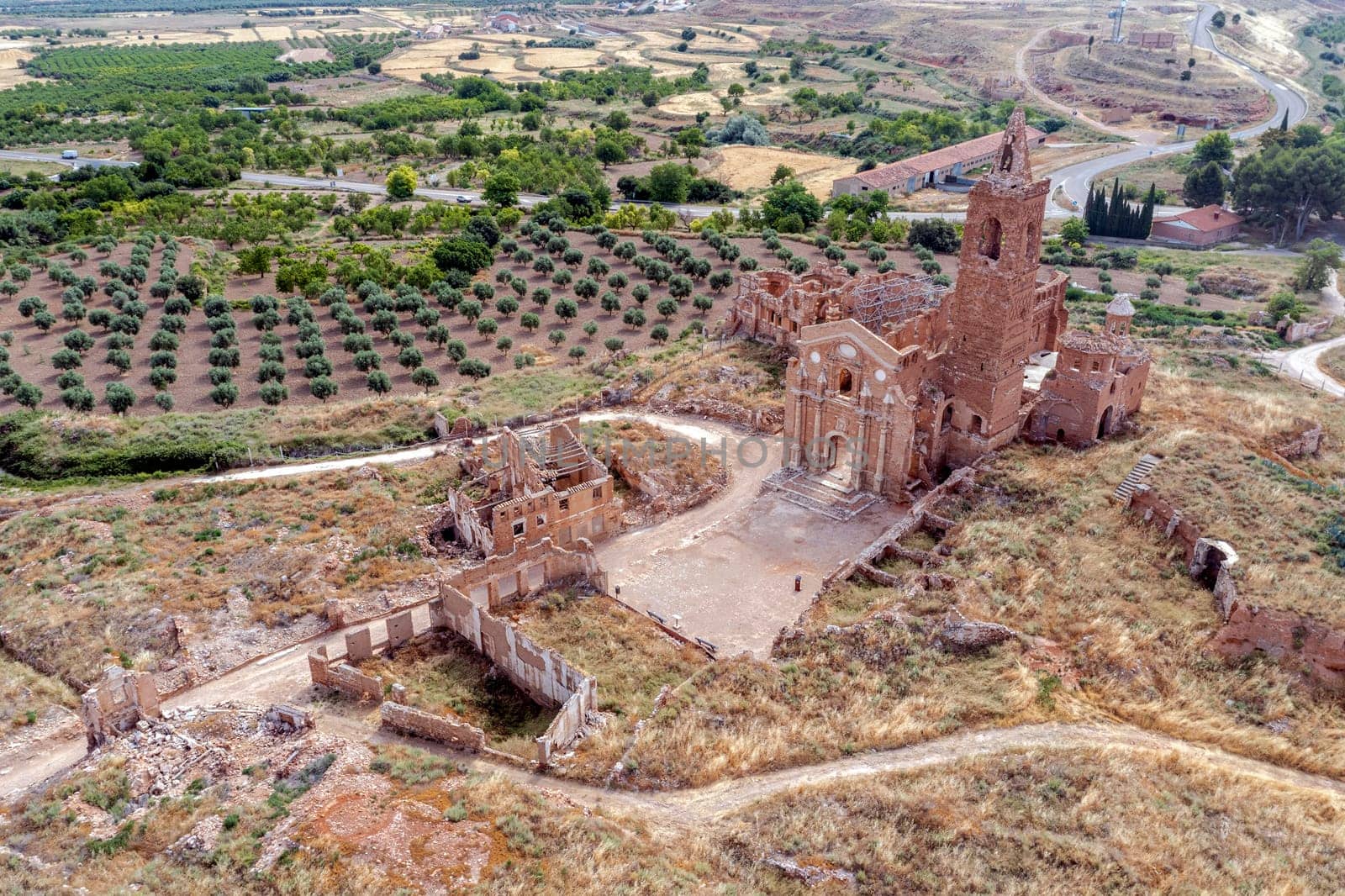a view of the remains of the old town of Belchite, Zaragoza Spain, destroyed during the Spanish Civil War and abandoned from then, highlighting the San Martin de Tours church, Front view