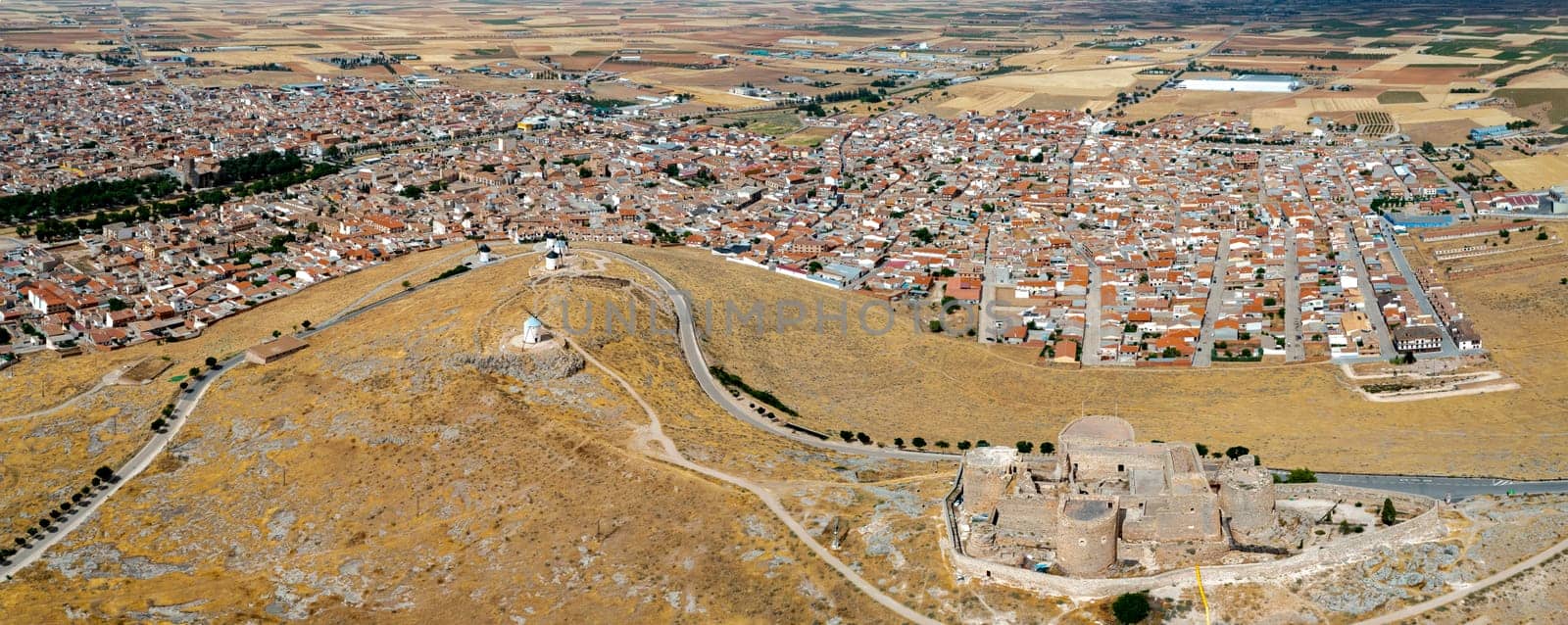 A panoramic view of the city of Consuegra in La Mancha from the top with the Muela castle, Toledo province, Spain