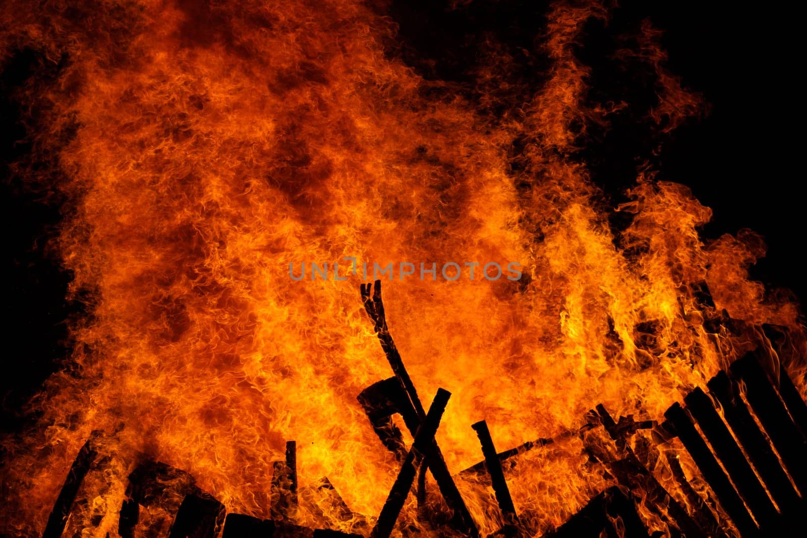 Fire flames background. Red hot flames of fire