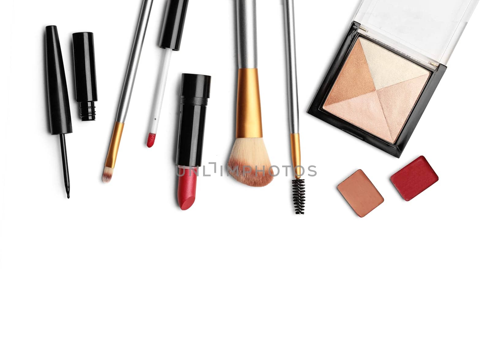 Make up products. Professional cosmetics over white background. Image with copy space.