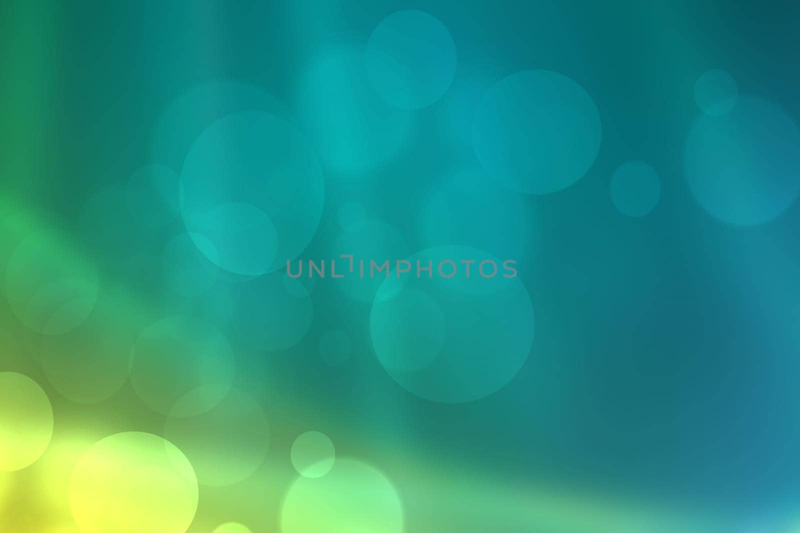 Abstract gradient light blue turquoise yellow green shiny blurred background texture with circular bokeh lights. Beautiful fresh backdrop. Space for design.
