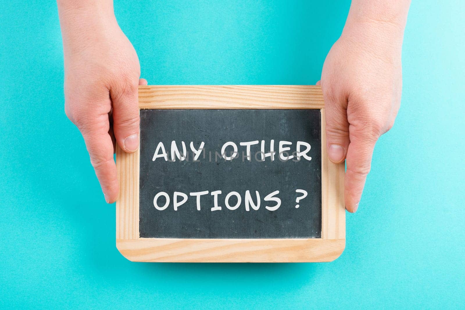 The phrase any other options is standing on a chalkboard, education, business and coaching concept, finding a solution, taking an opportunity
