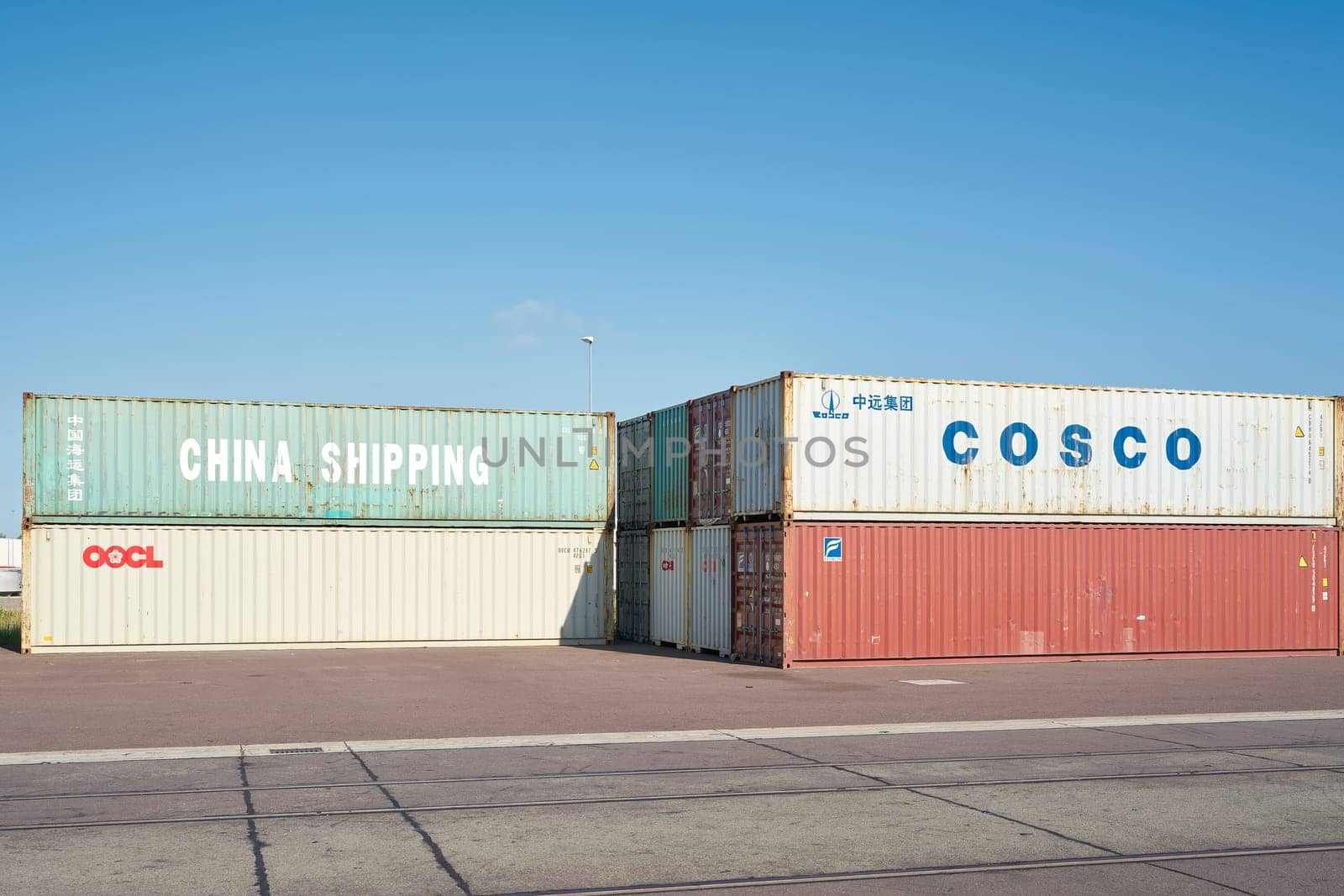 Containers from all over the world for import and export ready for onward transport in the port of Magdeburg