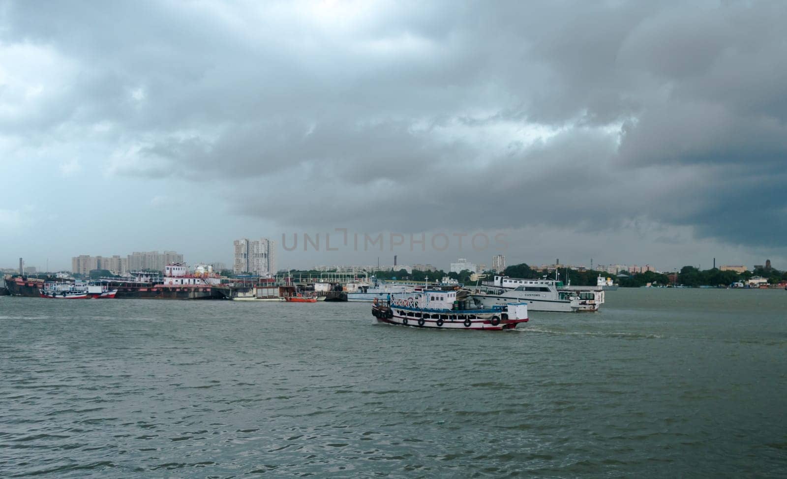 Beautiful Landscape View of Dramatic clouds over Ganges River horizon on a Dark cloudy day. View from Babu Ghat. Kolkata West Bengal India South Asia 19 June 2022
