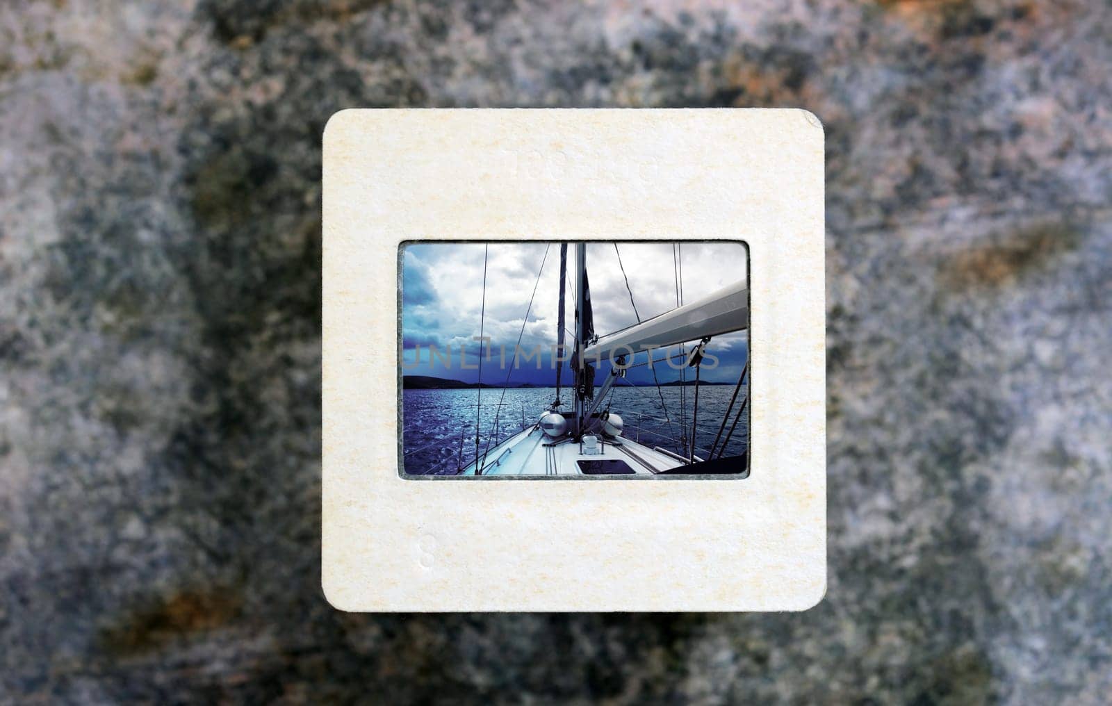 Sailing boat on slide film