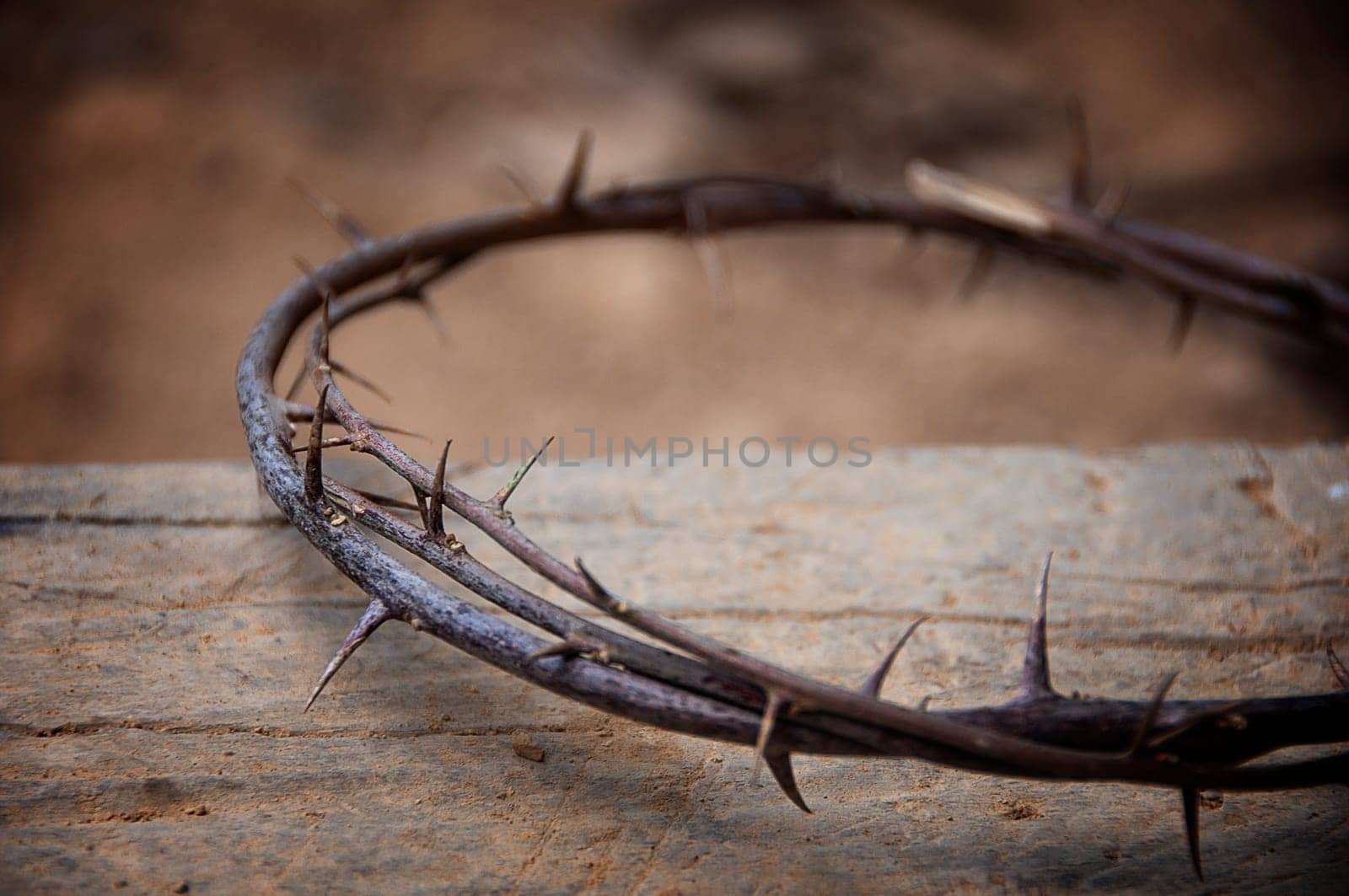 Copy space for Christian prayer text or quote with crown of thorns on old wood. Copy space