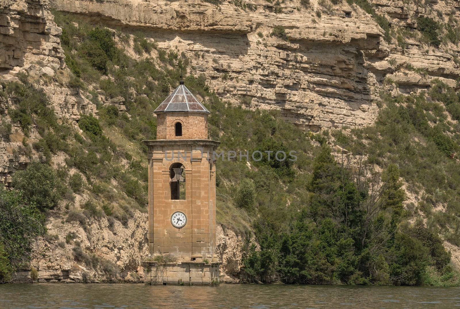 Tower of the Church of San Juan Evangelista in the Ribarroja reservoir, Aragon, Spain