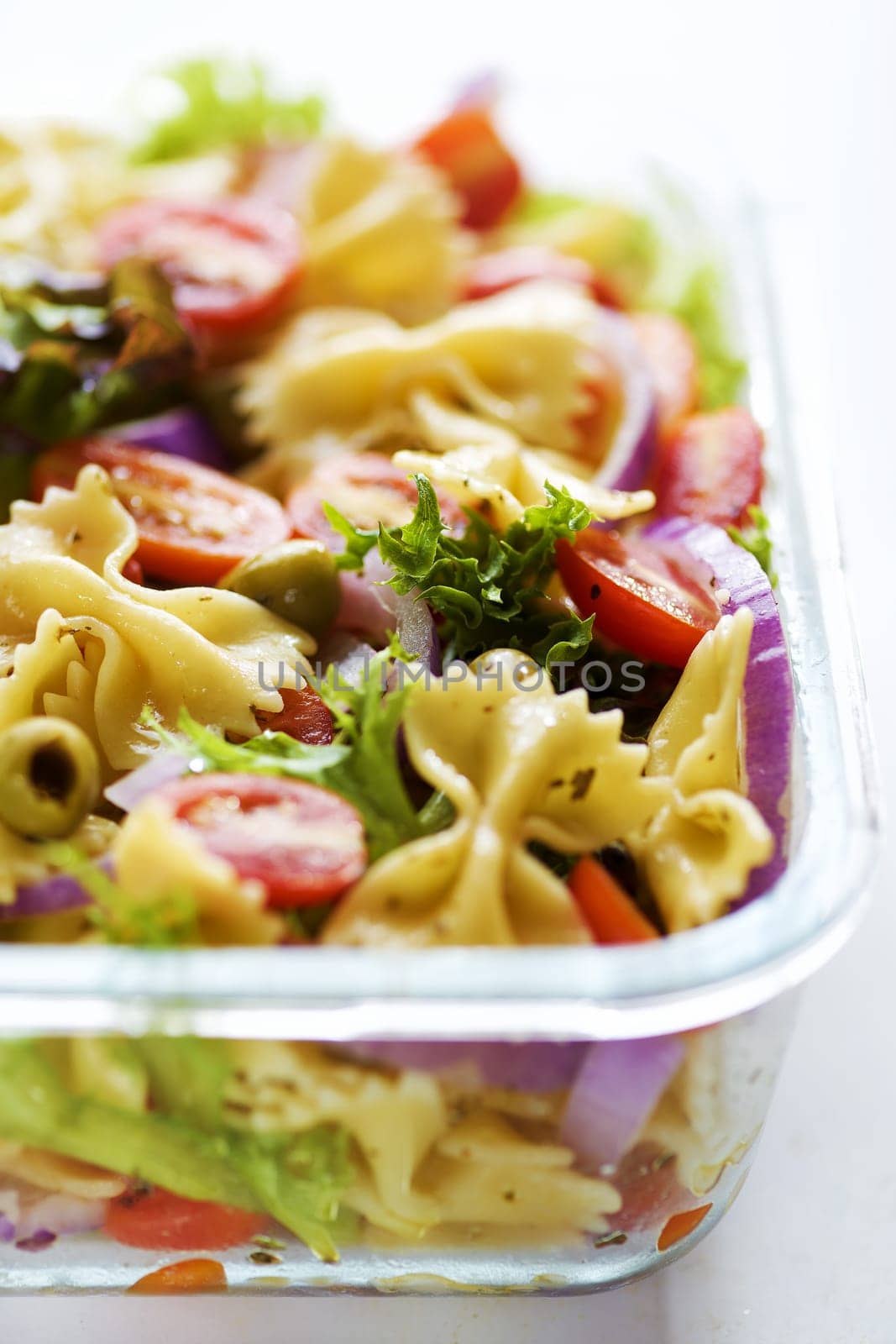 close up of a tray of pasta salad