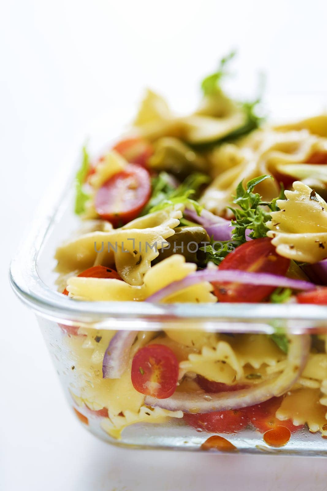close up of a tray of pasta salad