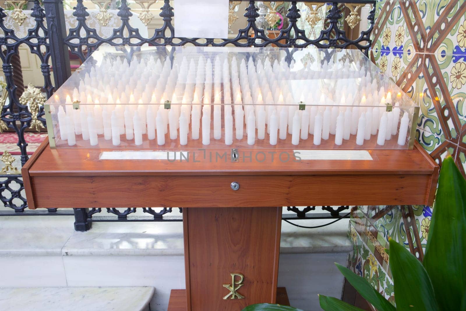 Flameless electric candles machine. It works inserting a coin as a donation to the church