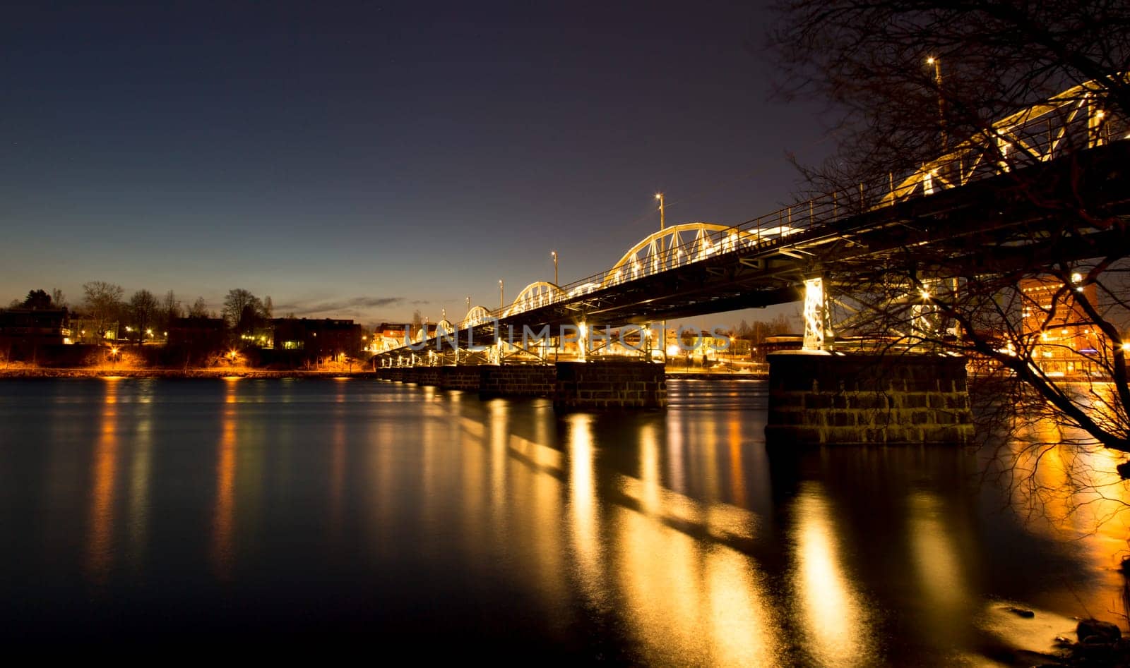 Bridge over River in Umeå, Sweden at night