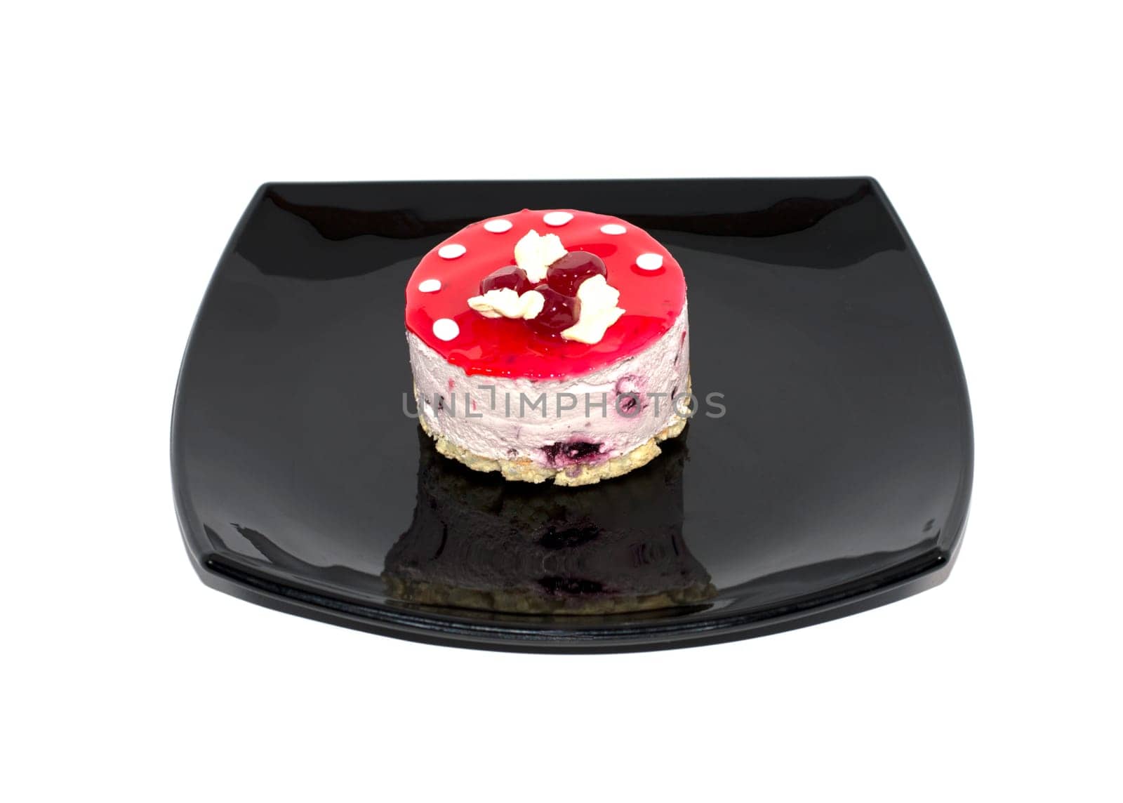 on a plate, cake with cream in the form of mushrooms