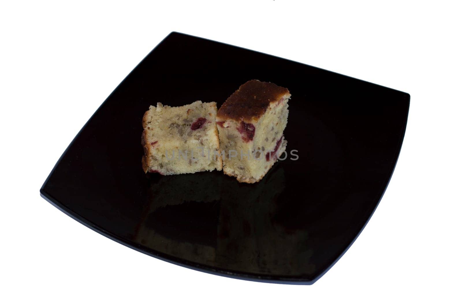 two slices of pie with cherry, in the center of a black plate