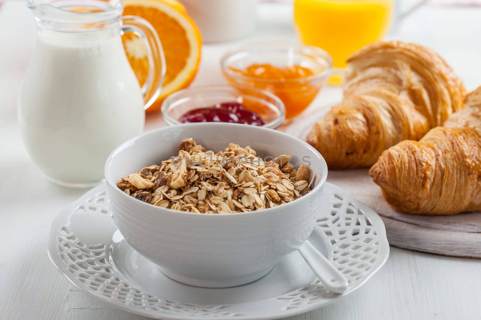Breakfast with cereal, milk, orange juice