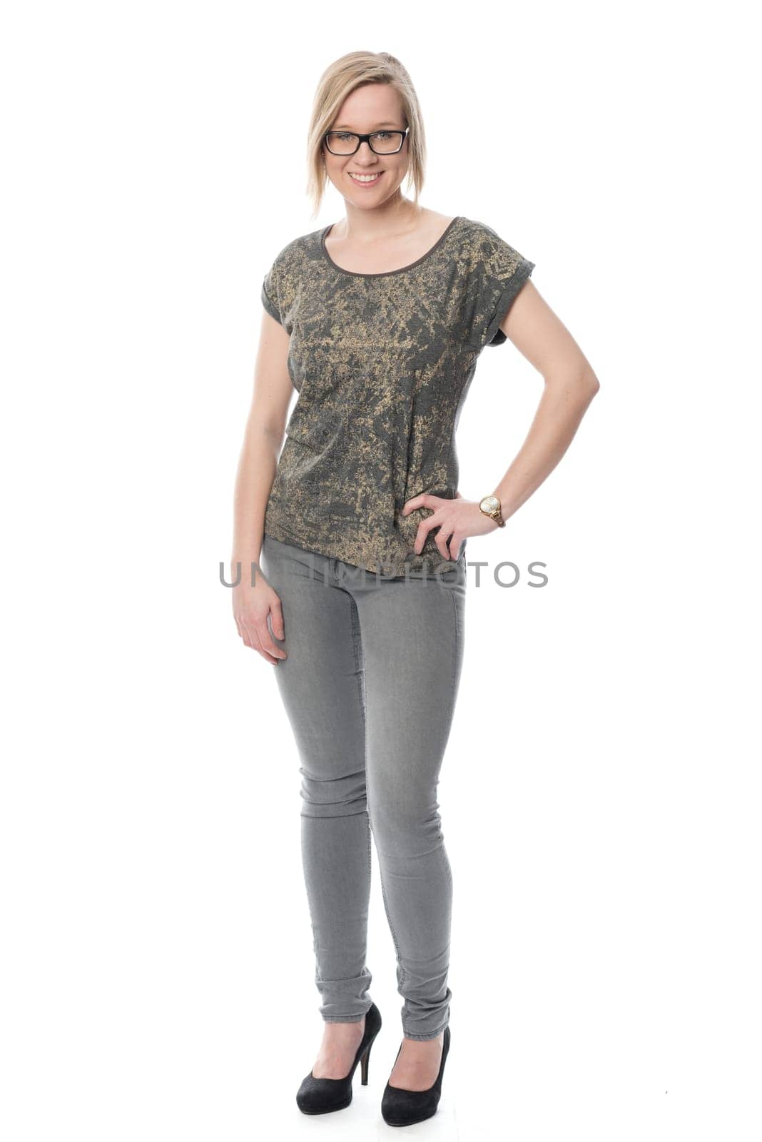 Young woman with glasses in jeans
