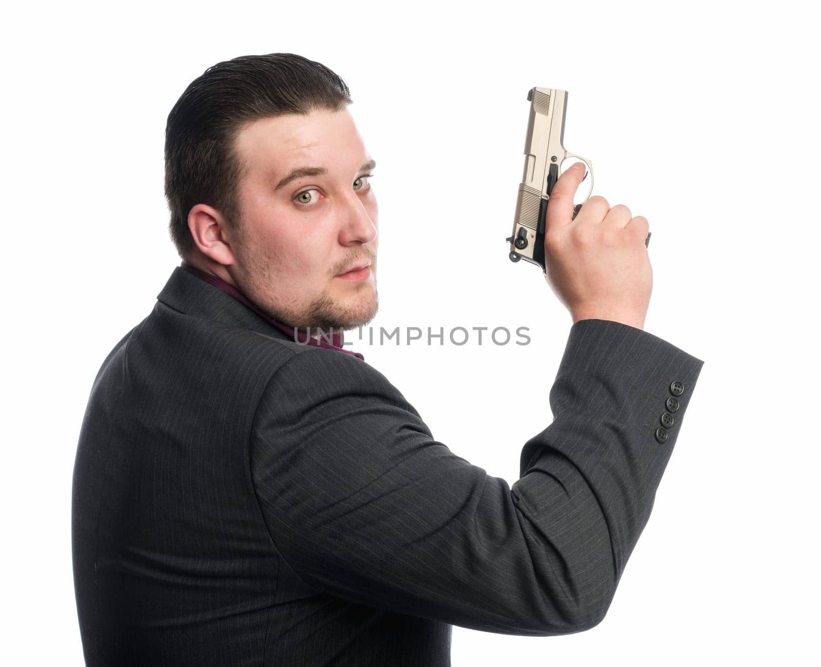 Young man targets with gun