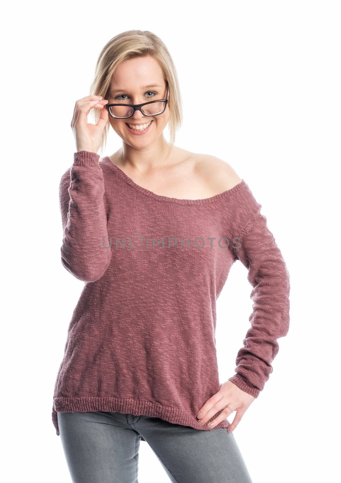 Young woman in jeans wears black glasses