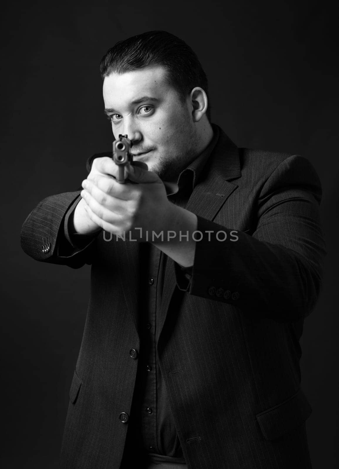 Young man targets with a gun
